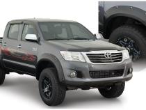Black Pocket/Rivet Style Smooth Finish 4-Piece Fender Flare Set For 2011-2013 Toyota Hilux Bushwacker