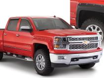 Black Pocket/Rivet Style Smooth Finish 4-Piece Fender Flare Set For 2014-2018 Chevrolet Silverado 1500 Fits 69.3 Inch Bed Bushwacker
