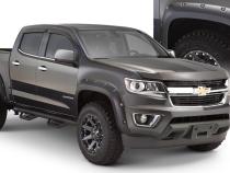 Black Pocket/Rivet Style Smooth Finish 4-Piece Fender Flare Set For 2015-2021 Chevrolet Colorado W/74 Inch Bed Bushwacker