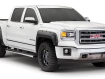 Black Pocket/Rivet Style Smooth Finish 4-Piece Fender Flare Set For 2016-2018 GMC Sierra 1500 (Incl Limited) Fits 69.3 Inch Bed Bushwacker